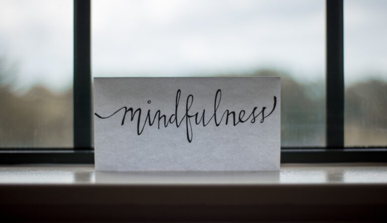 mindfulness printed paper near window